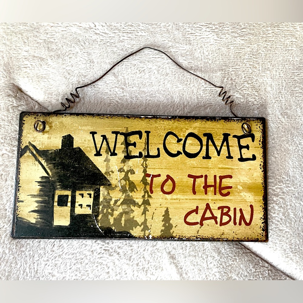 Primitive “Welcome To The Cabin” hanging sign. Metal.